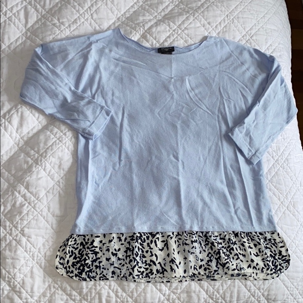 Beautiful light knit sweater with silky detail